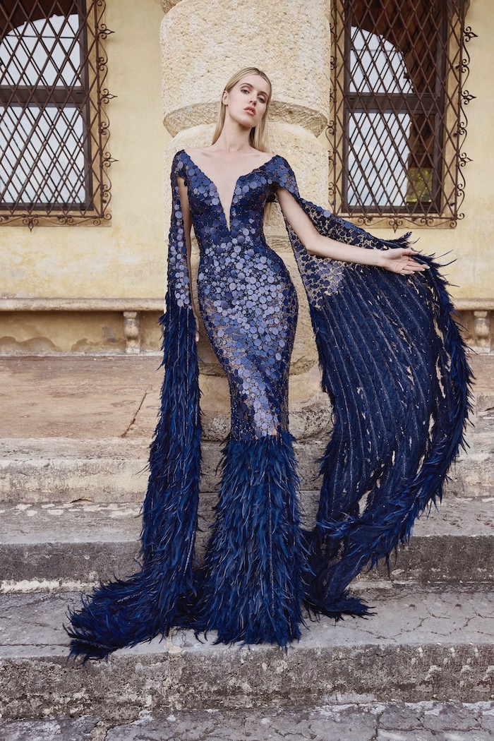 Exquisite hand embellished gown with feathers
