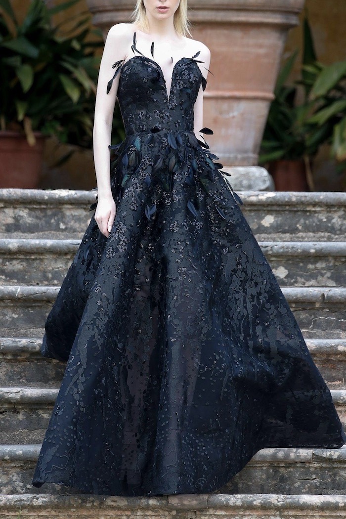 Exquisite embroidered gown with feathers